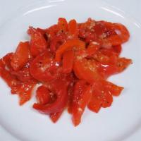 Roasted Red Peppers · Sliced and served in garlic, oregano and olive oil.