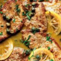 Veal Picatta · With lemon, capers, mushrooms, and garlic.