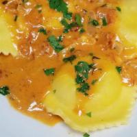Lobster Ravioli · Filled with Maine lobster in a tomato cream sauce.