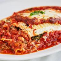 Lasagna Al Forno · With meat, ricotta cheese and spinach.