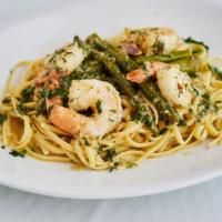 Linguini Con Gamberi & Asparagus · Linguini with shrimp and asparagus sautéed in olive oil and garlic.