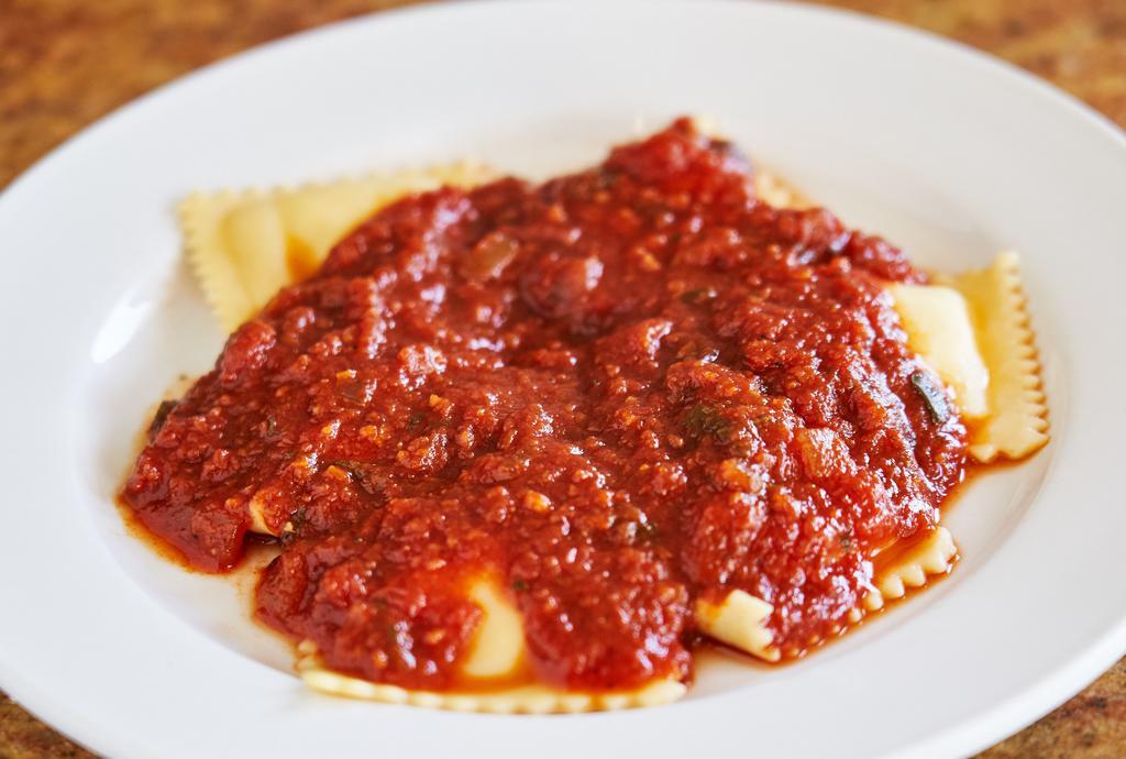 Ravioli · Filled with finely ground beef and served with marinara sauce.
