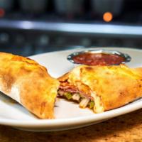 Vegetarian Calzone Small · Mushrooms, onions, tomatoes, bell peppers and olives.