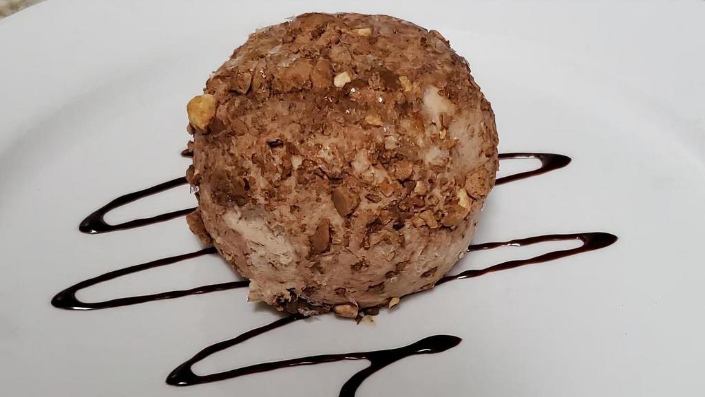 Tortuffo (Truffle) · Ice cream truffle.
Hazelnut, chocolate and lemoncello flavors are available.
(Hazelnut shown in picture)