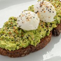 Avocado Toast · Artisan grain bread lightly toasted and topped with fresh avocado, two poached egs and 