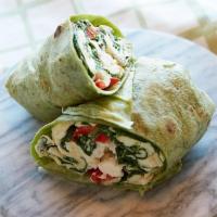Wellness Wrap · Scrambled egg whites, sauteed spinach, red bell pepper and feta cheese wrapped in a spinach ...