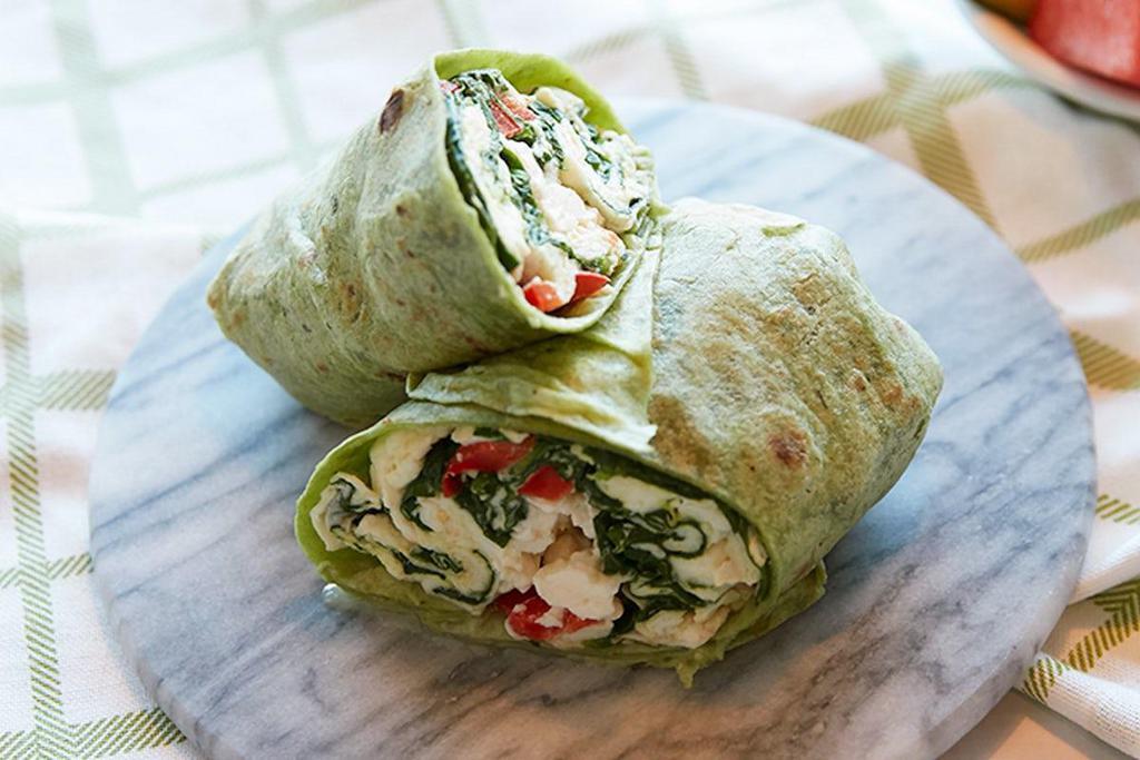 Wellness Wrap · Scrambled egg whites, sauteed spinach, red bell pepper and feta cheese wrapped in a spinach tortilla.