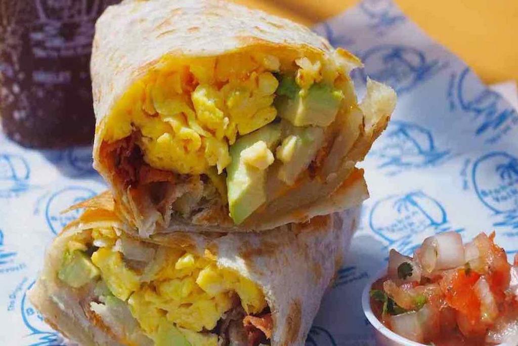 Cali Breakfast Burrito · Scrambled eggs, bacon, cheddar cheese, homefries and avocado wrapped in a flour tortilla.