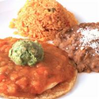 Huevos Rancheros · A grilled corn tortilla topped with two over medium eggs and homemade ranchero sauce.