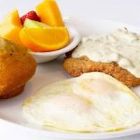 Chicken Fried Steak & Eggs · Beef Patty, breaded and fried like chicken, smothered in Country Gravy and served with your ...