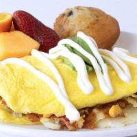 Californian Omelet · Bacon, homefries and American cheese.  Topped with avocado and sour cream.