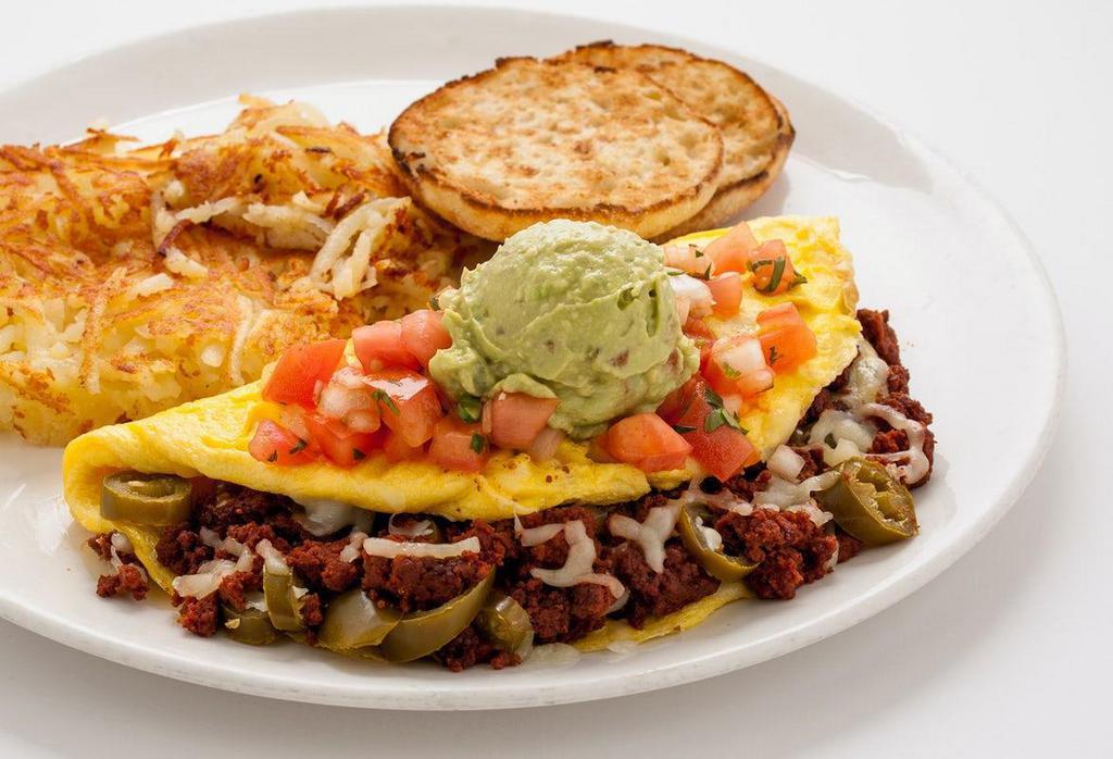 El Fuego Omelet · Spicy chorizo, jalapeno, Jack cheese.  Topped with salsa fresca and guacamole.