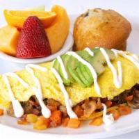 No Name Omelet · Bacon, tomato and mushroom.  Topped with avocado and sour cream.