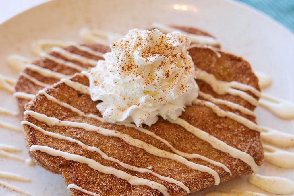 *New* Churro French Toast · Our Classic French Toast with Cinnamon & sugar, cream cheese icing & whipped cream.