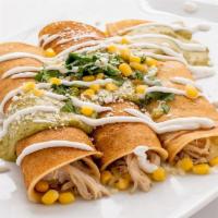 Savory Crepes · Three homemade crepes filled with shredded chicken, corn and jack cheese.  Topped with pobla...