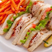 Club Sandwich · Triple decker sandwich filled with sliced turkey, bacon, lettuce, tomato and mayo on your ch...