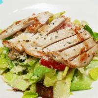 Grilled Chicken Caesar Salad · Grilled chicken breast atop Romaine lettuce tossed in Caesar dressing with tomato, parmesan ...