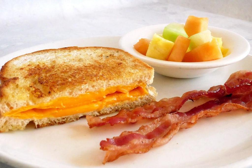 Kids Grilled Cheese · 1/2 Grilled cheese sandwich with choice of 2 sides and a drink.
