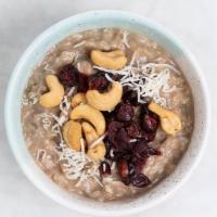 Almond Oatmeal (Df, N) · Rolled oats served w/ shredded coconut, dried cranberries & cashew nuts topped w/ steamed al...