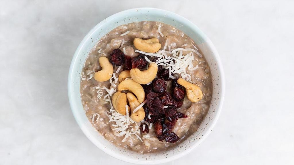 Almond Oatmeal (Df, N) · Rolled oats served w/ shredded coconut, dried cranberries & cashew nuts topped w/ steamed almond milk