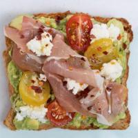 Avocado Toast W/ The Lot (G,D,S,Se) · Our classic avocado smash with cherry tomatoes, feta, prosciutto and a sprinkle of chili fla...