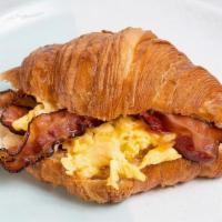 Bacon, Egg & Cheese Croissant · Fresh baked butter croissant with scrambled egg, bacon, cheddar & chipotle mayo.