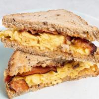 Bacon, Egg & Cheese Sandwich · Multigrain Toast with scrambled egg, bacon, cheddar & chipotle mayo.