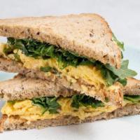 Egg & Cheese W/ Greens Sandwich · Multigrain toast with scrambled eggs, cheddar, arugula with house made Aussie aioli.
