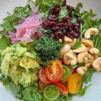 Feel Good Salad · Cherry tomatoes, avocado, pickled onions on arugula with cashew nuts, cranberries, chopped d...