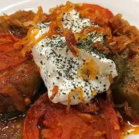 Sauteed Eggplant · eggplant and tomato slices in a smoky tomato sauce and topped with mince garlic yogurt sauce