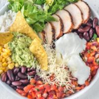 Classic Cheese Burrito Bowl · Bowl filled with rice, beans, lettuce, mild salsa, melted mixed cheese, sour cream and pico ...