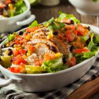 Cajun Chicken Burrito Bowl · Juicy cajun chicken filled with rice, beans, lettuce, mild salsa, melted mixed cheese, sour ...