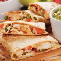 Crispy Chicken Quesadilla · Delicious crispy chicken with pico de gallo, melted mixed cheese and served with salsa and s...