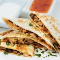 Grilled Chicken Quesadilla · Delicious grilled chicken with pico de gallo, melted mixed cheese and served with salsa and ...