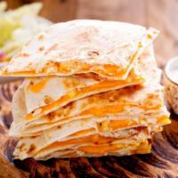 Cheese Quesadilla · Filled with pico de gallo, melted mixed cheese and served with salsa and sour cream.