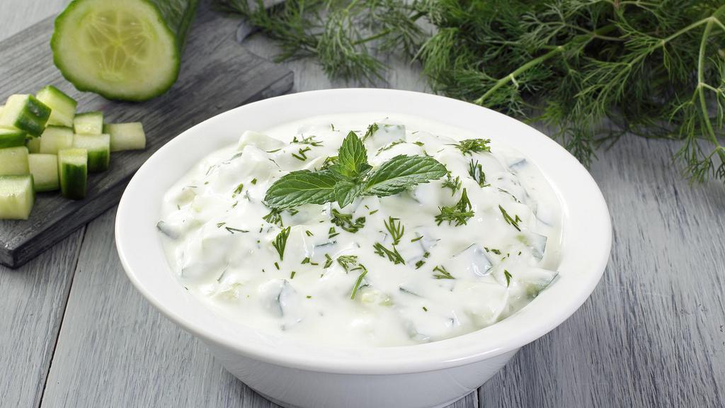Yoghurt With Cucumber · Yoghurt with Cucumber (Mast-o-khiar) is a scrumptious classic Persian salad of cool cucumbers with creamy yogurt, and infused with fragrant herbs.
