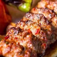 Beef (Kofta) Kabob · Ground Beef meat served with rice, hummus, salad, pita bread and garlic sauce.