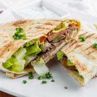 Lamb-Beef Gyro Wrap · Lamb and beef wrapped in a pita bread with lettuce, tomato, onion, hummus, jalapeños comes w...