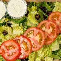 Green Salad · Lettuce, tomatoes, olives, and shredded carrots. With sides of ranch.