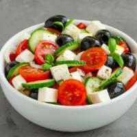 Greek Salad · Fresh, crisp romaine lettuce with ripe tomatoes, kalamata olives, cucumbers, onions, feta an...