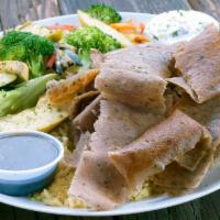 Gyros Plate With Grilled Veggies · Beef/Lamb shaved off a vertical broiler, served with rice pilaf, grilled vegetables, tzatzik...