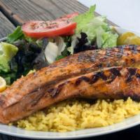 Grilled Atlantic Salmon Plate · Salmon fillet, served with mixed green salad, rice pilaf, pita bread. Fish is purchased fres...