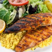 Grilled Tilapia Plate · Grilled fillet, seasoned, served with mixed green salad, rice pilaf, pita bread. Fish is pur...