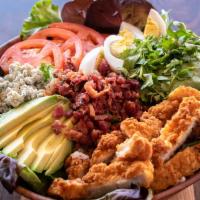 California Cobb · Fresh spring mix with crumbled bleu cheese, sliced tomato, bacon, sliced hard-cooked egg, av...
