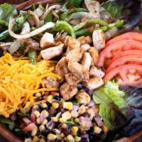 Fajita · Fresh spring mix with fresh grilled onions and green peppers, shredded cheddar, tomato and a...