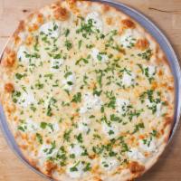 White Pie · Creamy ricotta and mozzarella cheese topped with fresh garlic and parsley.