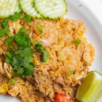 Combo Fried Rice · Fried rice with egg, onions, tomatoes, and combination of chicken, beef, pork, and shrimp (2).