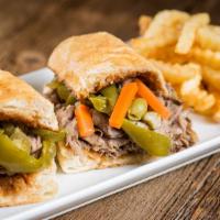 Italian Beef · Thinly cut Italian Beef served on French Bread.  Includes side of Au Jus.