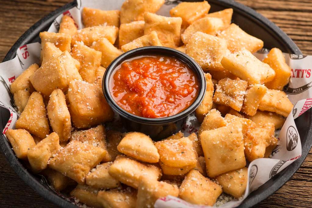 Rosati’S Dough Nuggets · Bite-sized pieces of crispy pizza dough tossed in garlic butter sauce and served with a side of marinara. Serves three to four. 2000 cal.