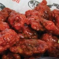 1/2 Lb. Boneless Wings · Tossed in the sauce of your choice and served with choice of dressing. Half lb six to eight ...